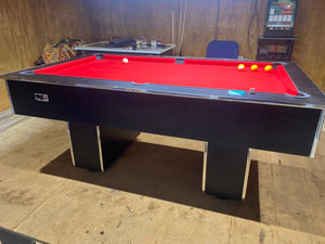 Superpool Black Pearl pool table with red felt and black laminate finish.